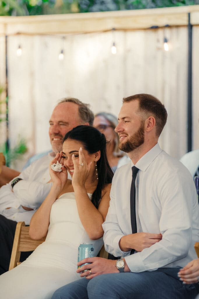 Bride and groom laughing during wedding photos in Nashville