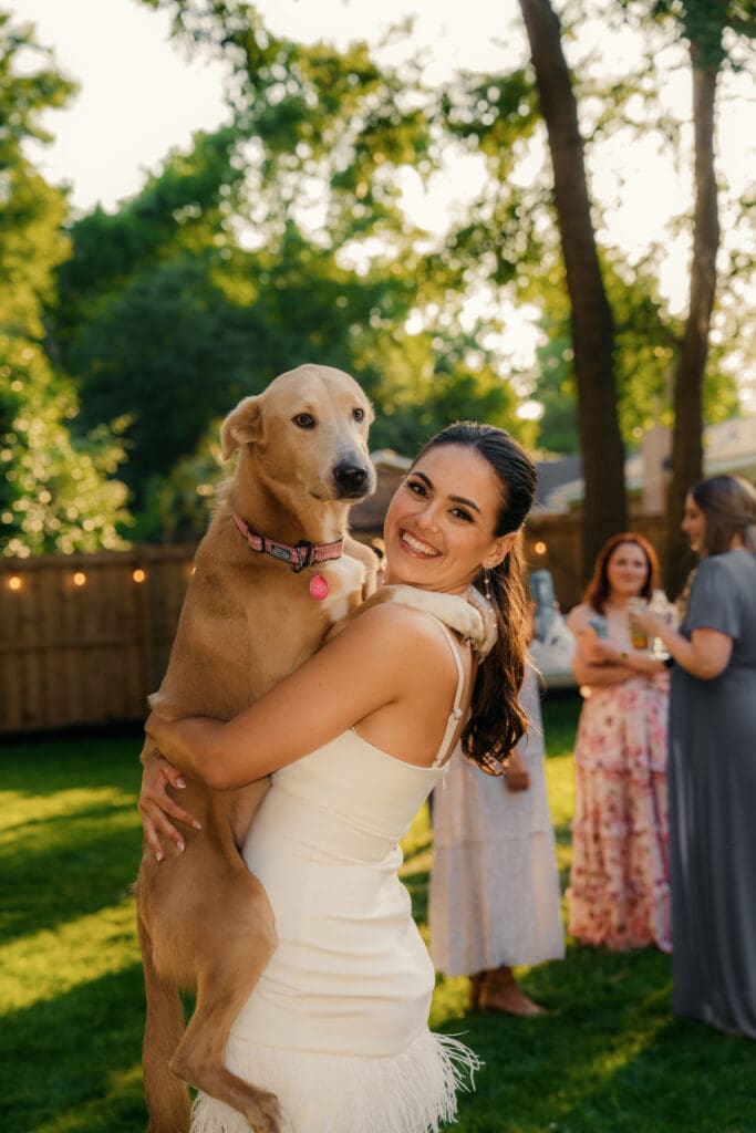 Charleston SC Wedding, A bride carrying her dog!