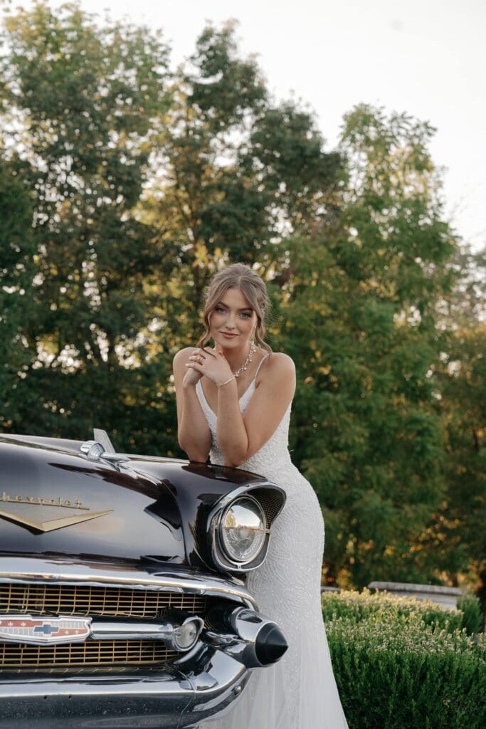 Bridal Portrait of bride with vintage getaway care in Nashville