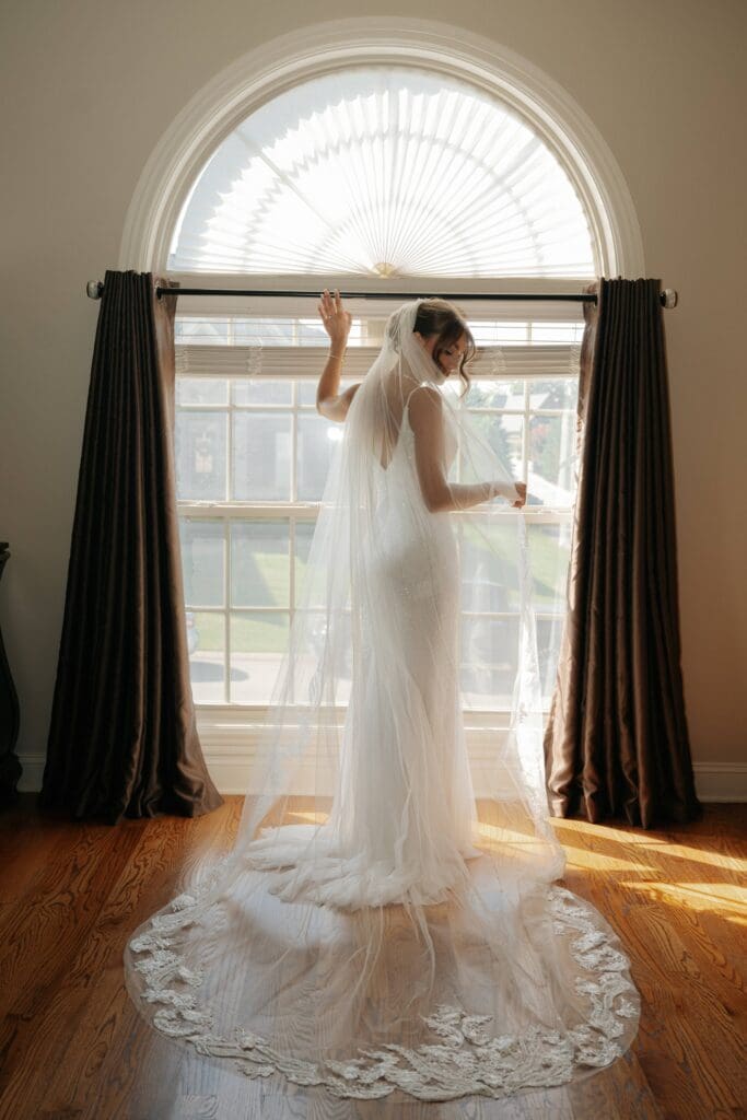Candid moment of bride getting ready for wedding in Nashville