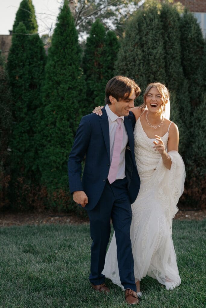 Bride and groom laughing during wedding photos in Nashville