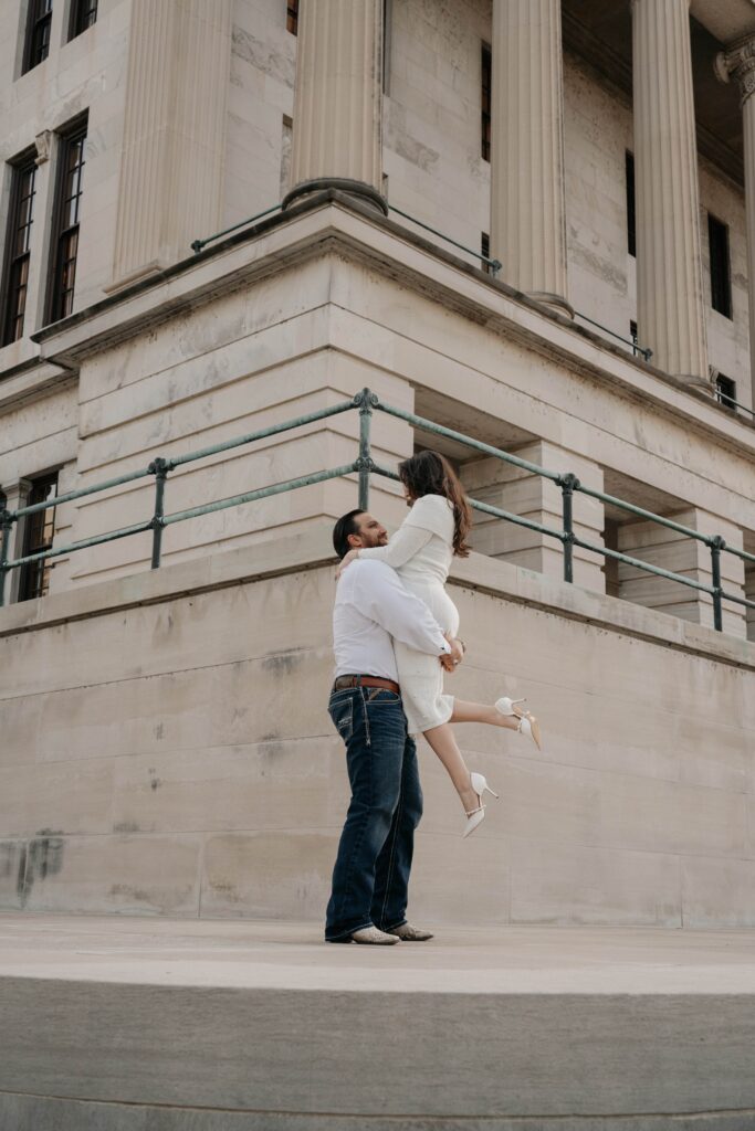 Nashville couple taking engagement photos at Capital building