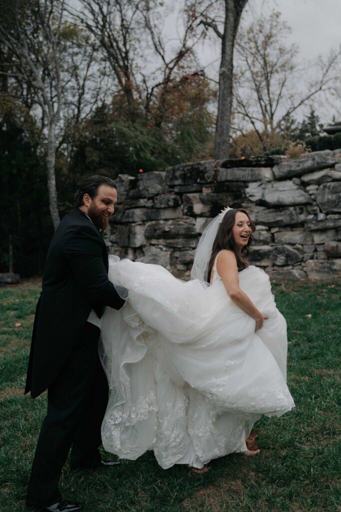 Couple walking back from their portraits to their wedding reception 
