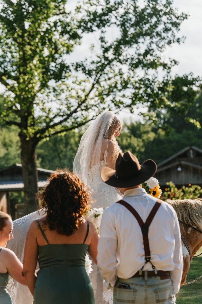 Bridal party looking at bride at Cactus creek